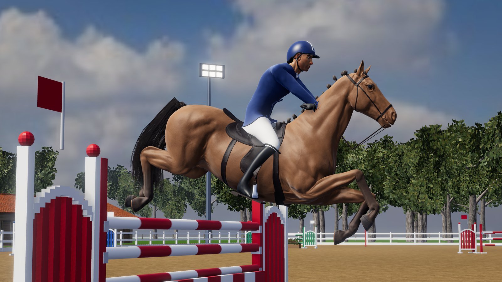 Horse and rider mid-jump over a red and white fence